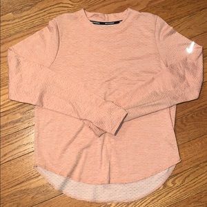 . Nike Dri-FIT Pink Sweater